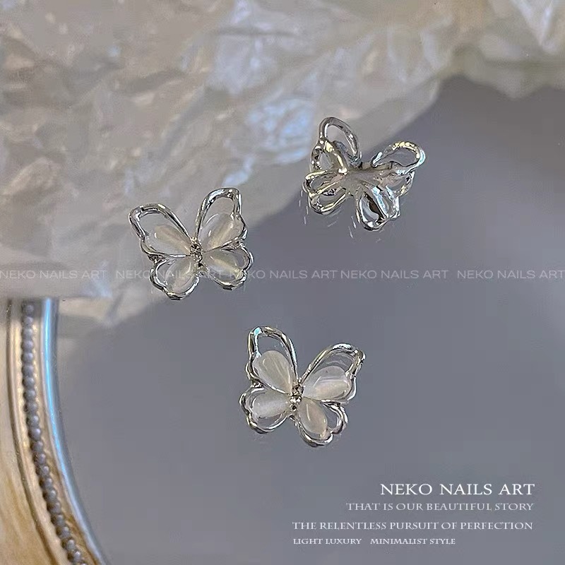 蝶の形をしたネイルジュエリー5個、新しい豪華な合金製の3Dネ - Nova Decor & Lighting Julestjerne のレビューと価格